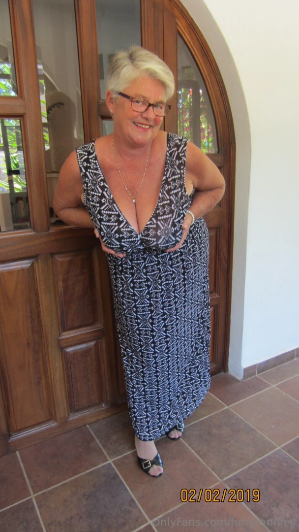 Getting ready to go out for the evening in my sexy long dress 
