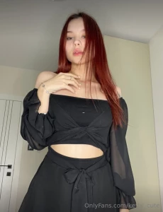 Rocking a chic black ensemble with a touch of sweetness every detail