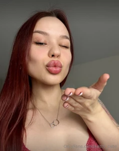 Wrapped in this crimson embrace you exude confidence and allure a