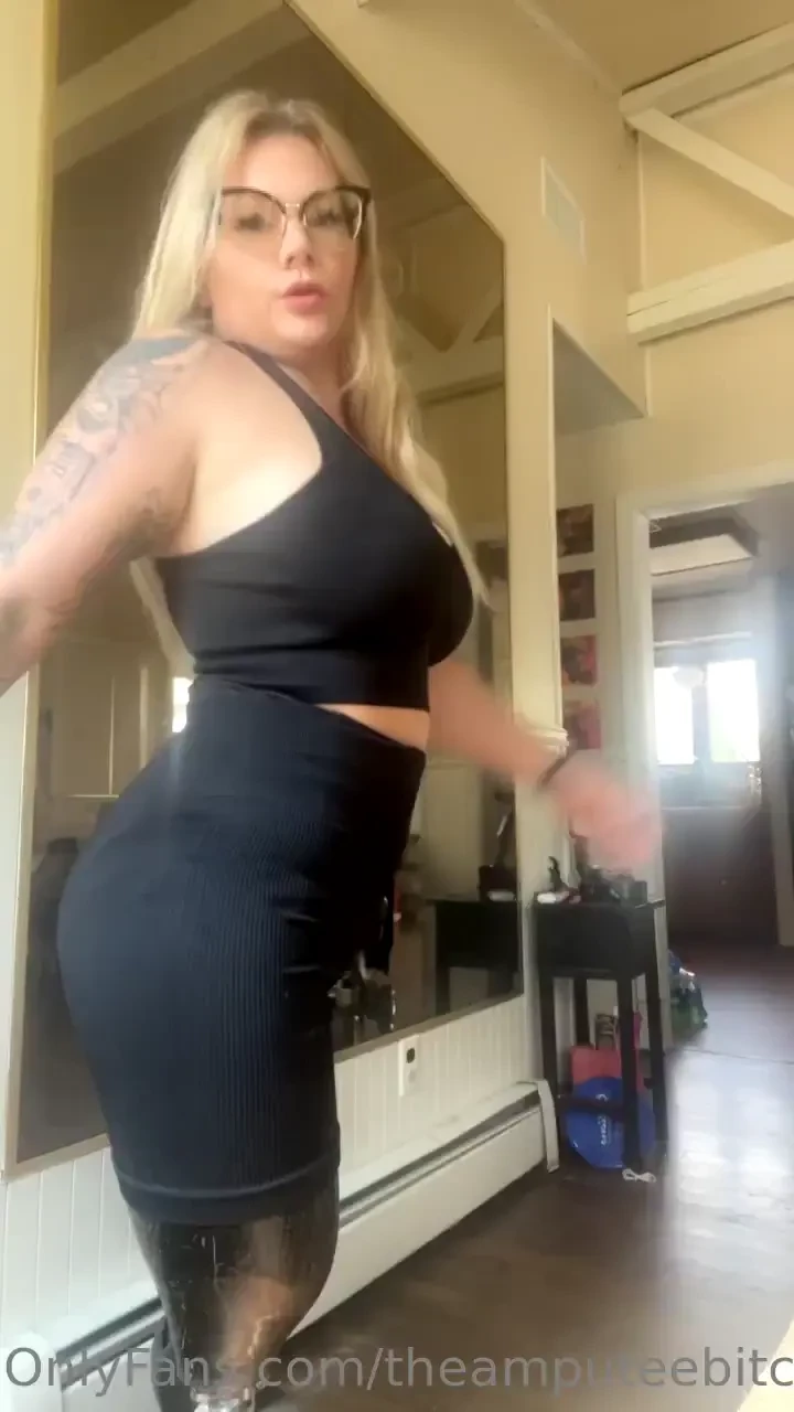 Walking in prosthetics posing in yoga outfit 