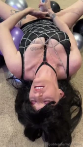 A bed of balloons masturbating on a bed of balloons in cosplay