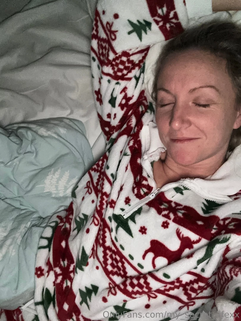 Snuggled in bed had to close my eyes because of the flash hubby s 