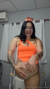 Delicious as a pumpkin walking with my crutches and heels wearing my