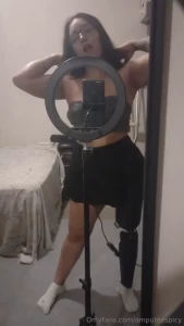 I put on my prosthesis i turn on the camera in front of the mirror to