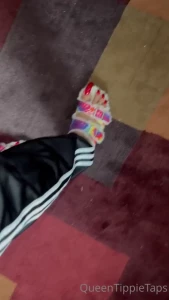 Track pants and sandals