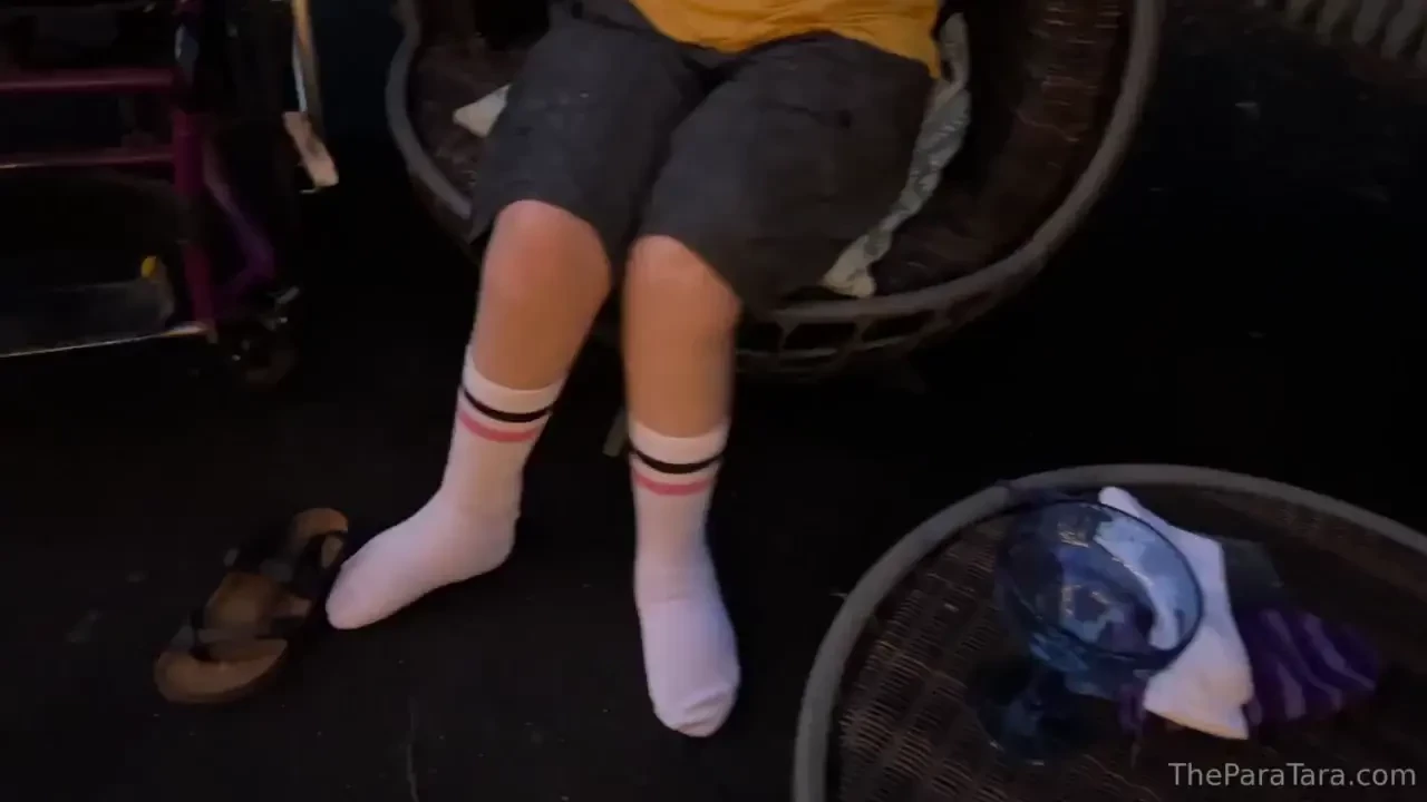 Chilling out by a fire and koi pond tonight oh and cute striped socks 