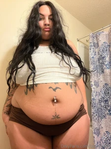 Does my belly make your knees weak i know you want to drop down and