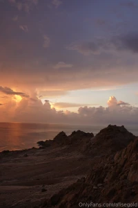 In the evening as the sun sets over the horizon the sky is colored in
