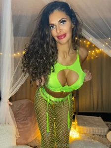 I mentioned i took pics in a neon green fishnet ensemble here it is part 2