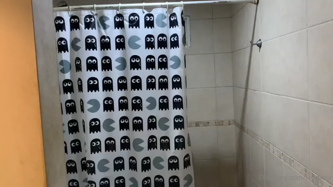 2 bears playing in a shower 