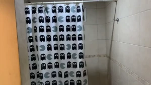 2 bears playing in a shower
