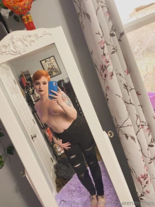 Who has short orange hair and just finished shooting a new set and two