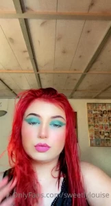 So i dyed my hair red and i think i look like either jessica rabbit or part 2