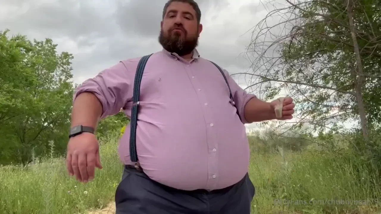 Fat daddy was hungry on his way to the office so had to stop to grab 