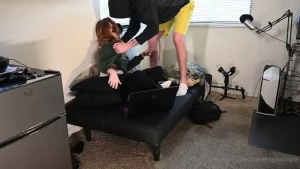 Nerd studying atomic ripping wedgie