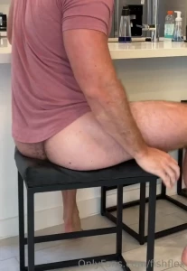 Close up of my hairy ass sitting in a chair squishing my cheeks
