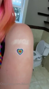 One of my pride outfits that i wore to the seattle pride parade i look