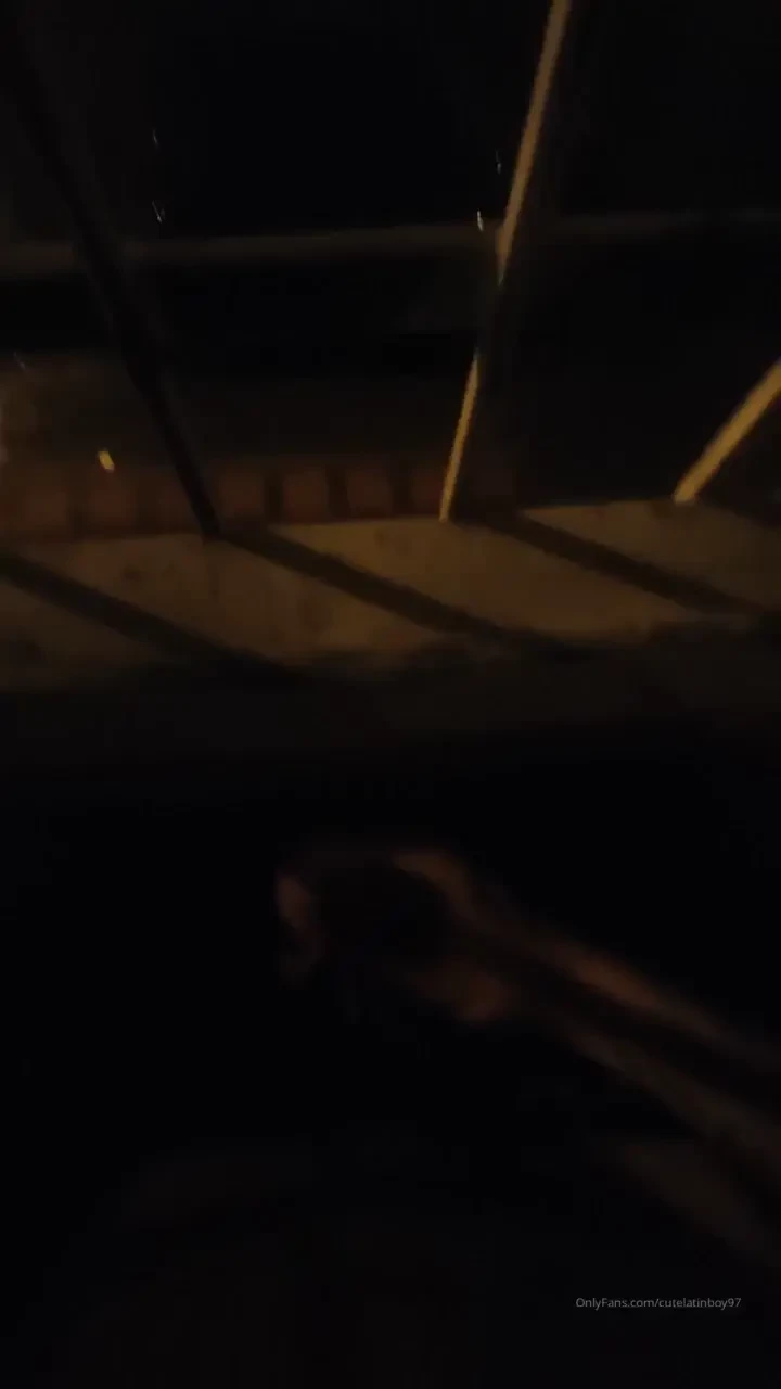 Playing on the window with cars passing by 