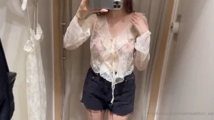 Trying on transparent tops