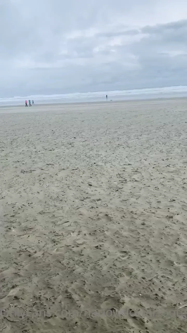 Walking to the beach thank goodness for rain boots 