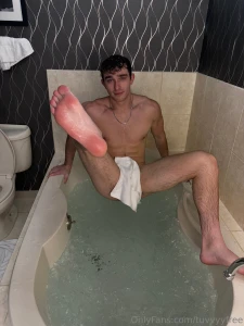 I slid my wet feet across the soft carpet in the tub and instantly