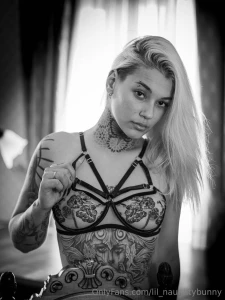 Would you date a blonde with tattoos all over her body part 1