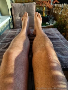 My hairy legs and feet outdoor in the sun and my cock