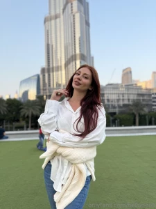 In a green field where dreams grow and buildings remind you of