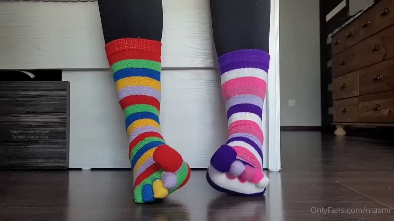 10 october - mismatched colorful striped toesocks slowly taking off 