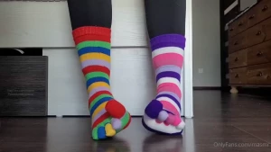 10 october - mismatched colorful striped toesocks slowly taking off