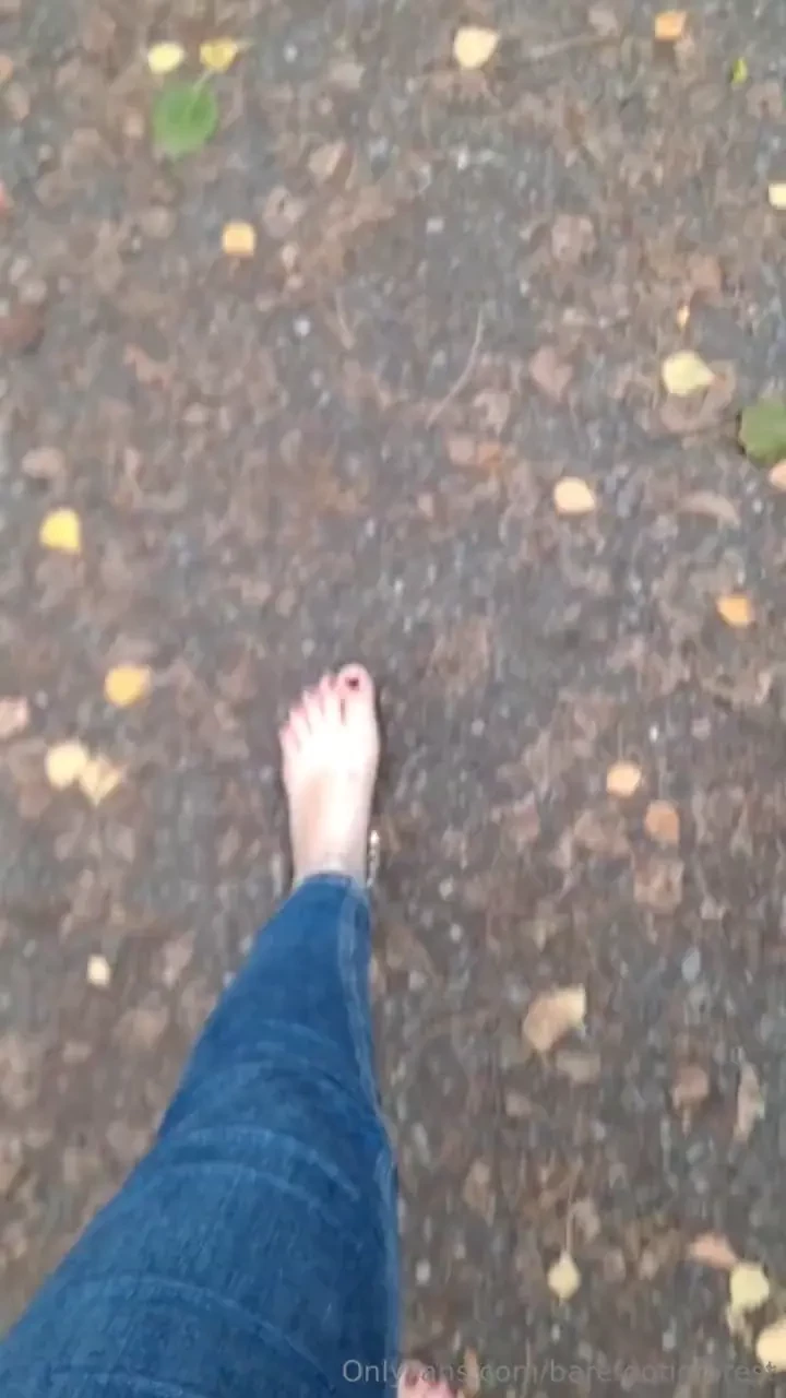 Walking barefoot in the cold autumny asphalt feels different under 