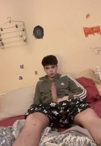 Stroking my big dick in bed i stripped out of my hoodie and shorts and