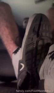 At the feet of an unaware giant gamer