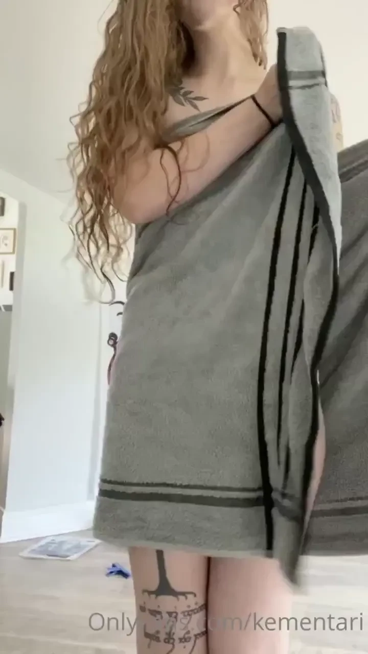 A very rare absolutely no makeup fresh out of the shower towel drop 