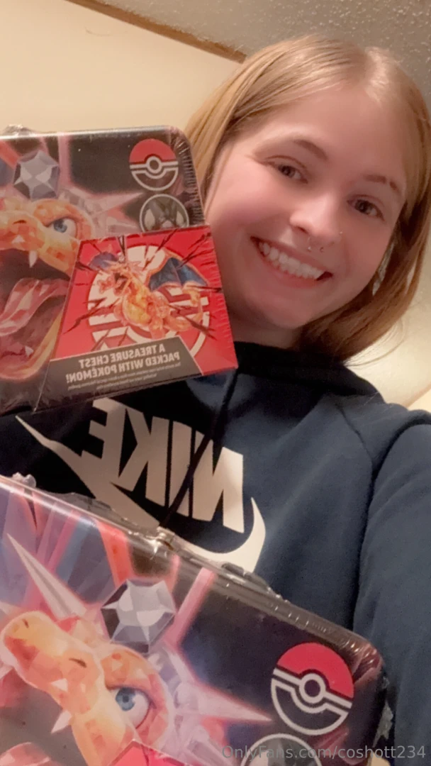 Omg i m about to rip two charizard tins and i m way too excited 