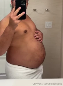 Popping buttons barely able to wrap a hotel towel around my ass the