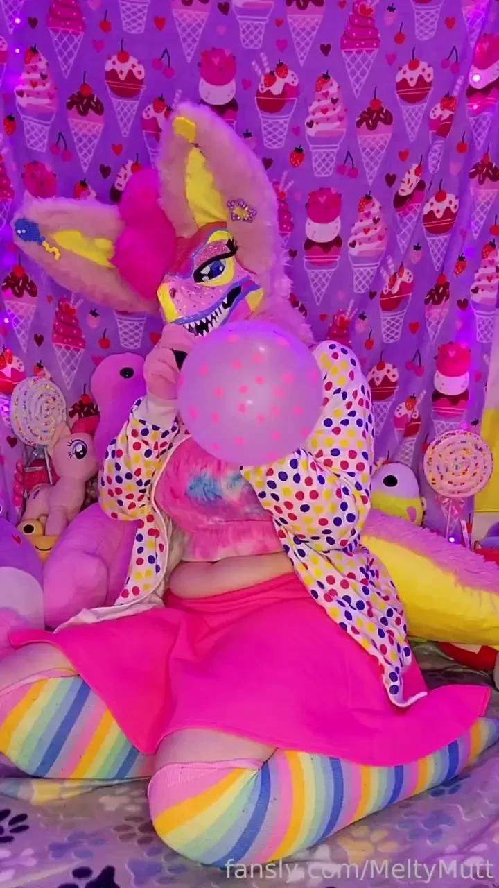 Cupcake blows up a pretty balloon till it just pops balloons balloon 