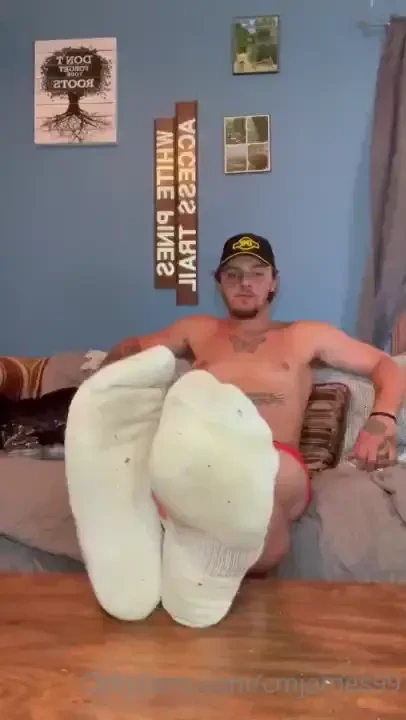 Toes wiggling in white socks 