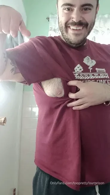 My hairy moob is peaking through ripped at the seams from my fat on my 