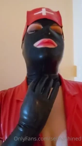 Nurse shine checks over her outfit ready for shift listen to the