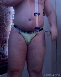 Chugging some cider in tight clothes