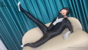 Glossy tight-fitting zentai suit medical latex gloves snugly encased