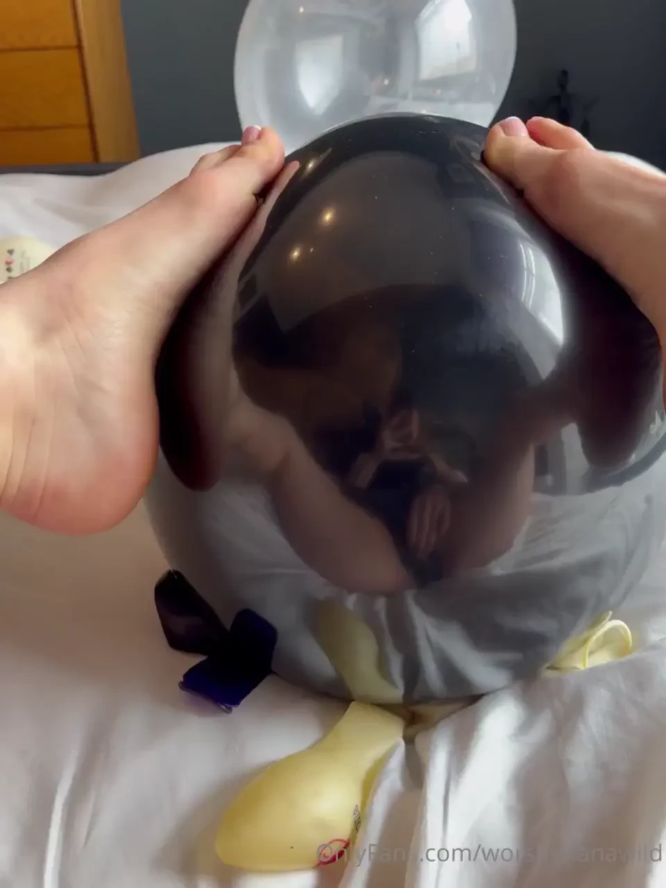 Teasing you by playing with my pussy in the reflection of the balloon 
