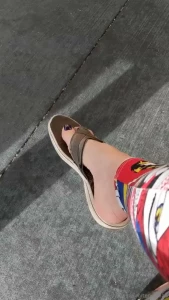 Dangling my flip flop at the restaurant