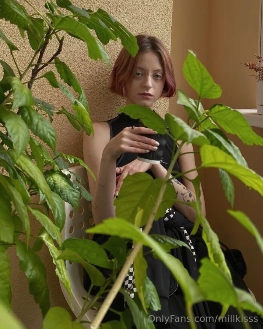 My morning ritual coffee plants and me like a botanical witch with an 