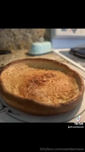 Breakfast is a homemade dutch baby with a strawberry reduction after