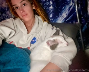 Snuggled up in bed reading books for my veterinarian technician class