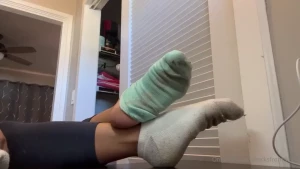 White hanes and teal sweaty ankle sock removal