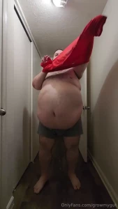 Squeezing into my large red shirt and then showing off how the 3xl