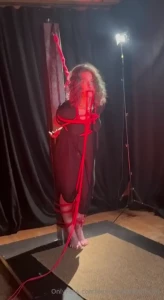 Hanging on a pole asked to hold the rope for him for a few seconds got